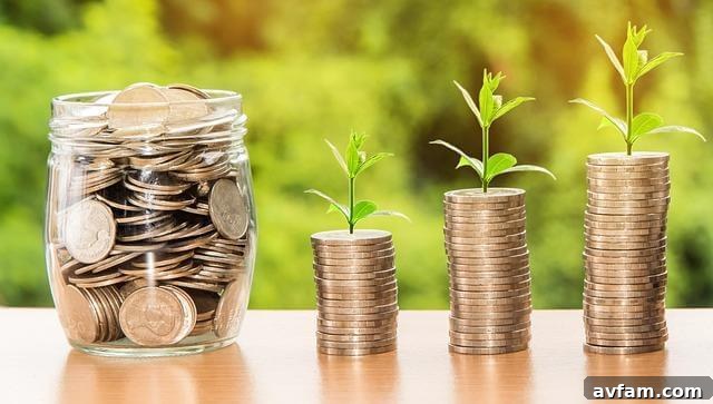 Glass jar with coins and a plant growing, symbolizing