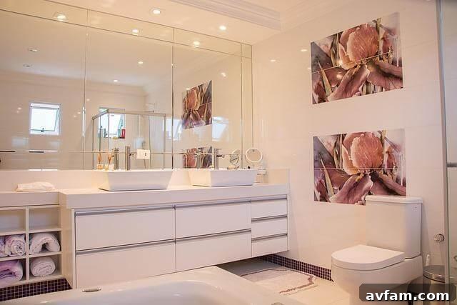 Modern bathroom with sink, mirror, toilet