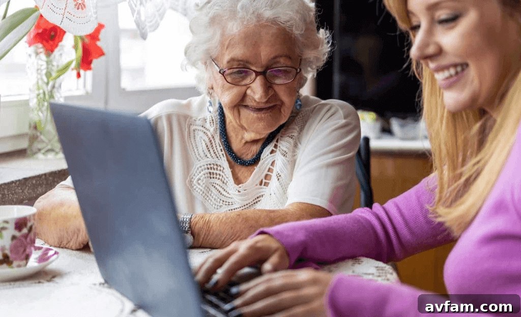 6 Ways Live-In Care Eases Loneliness for Older Adults 2 Older woman using a laptop, showing connection