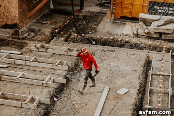 Can You Sue After a Construction Accident? How to File a Claim 3 Man in red jacket on a construction site,
