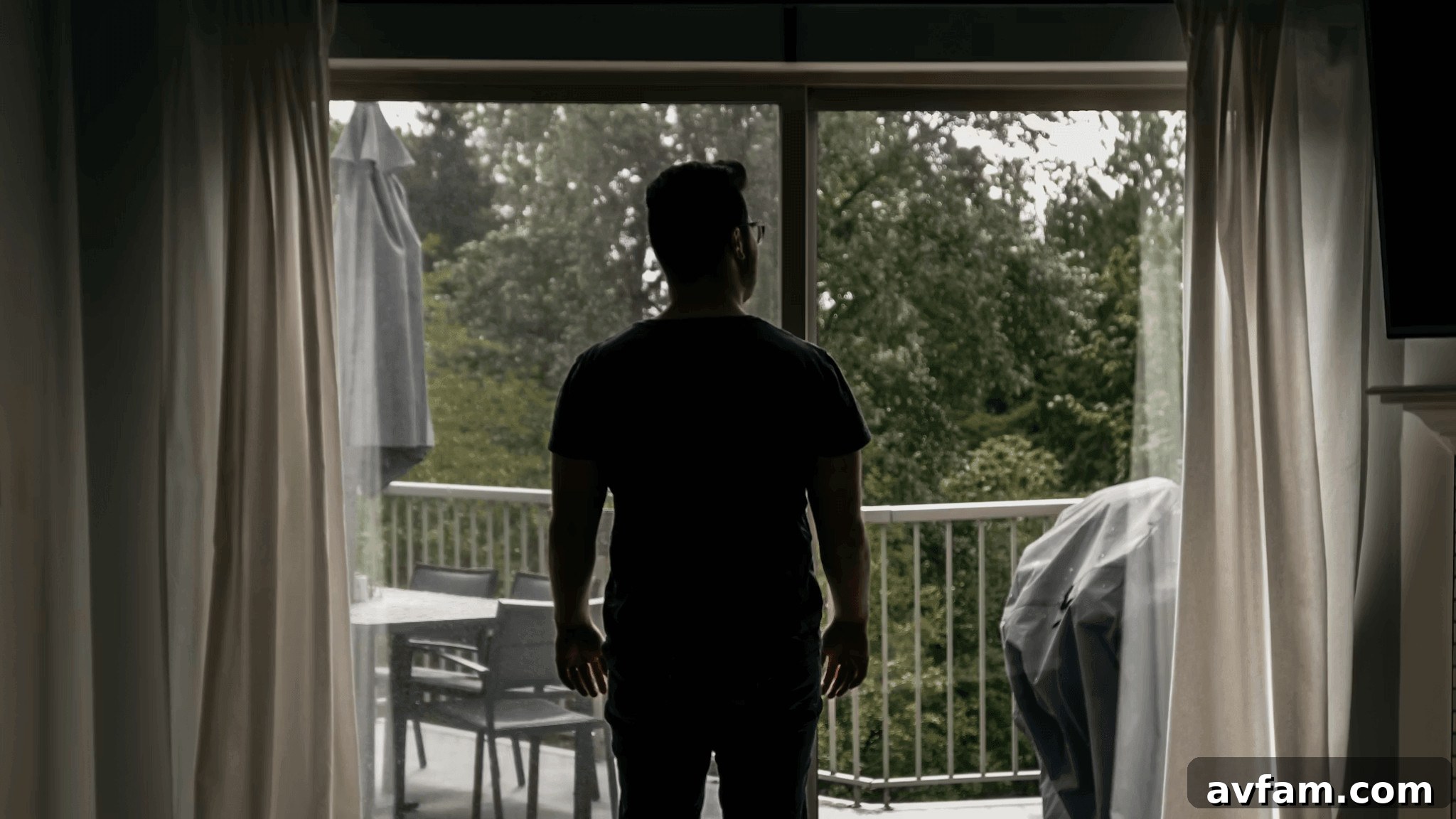 Man standing in front of a sliding