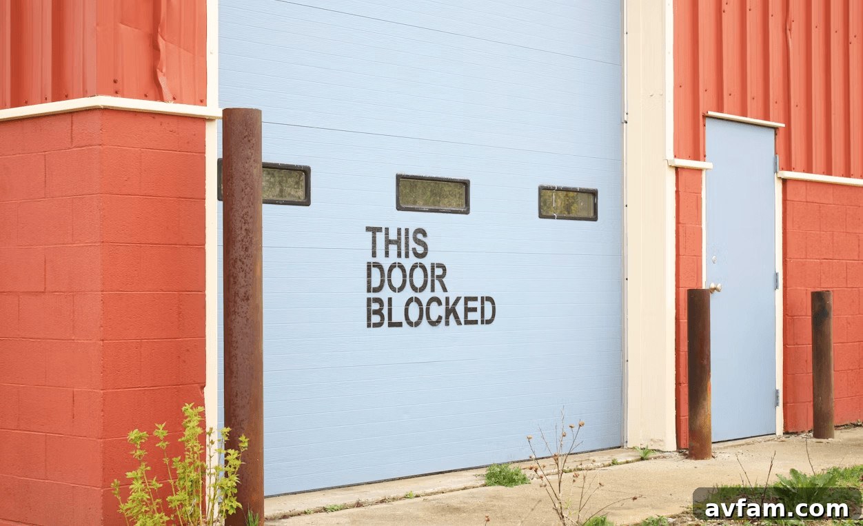 A blue and red industrial building with a