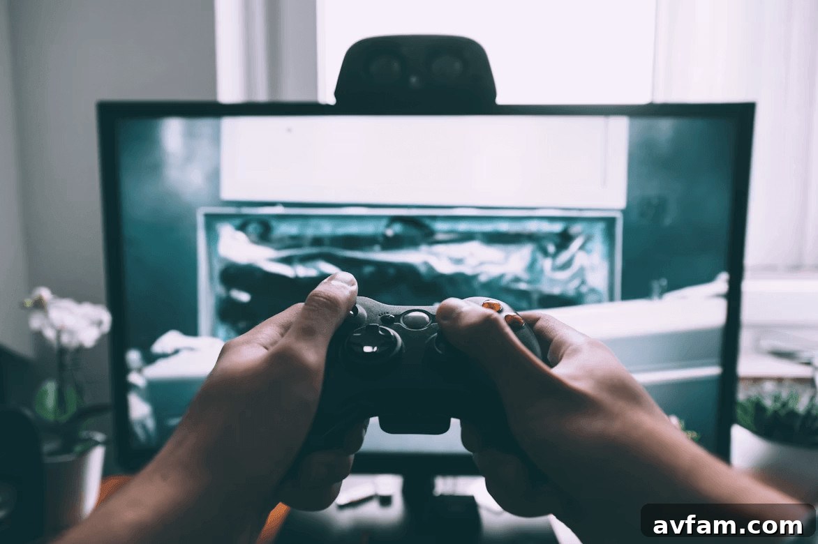 Person playing a video gamecontroller on an