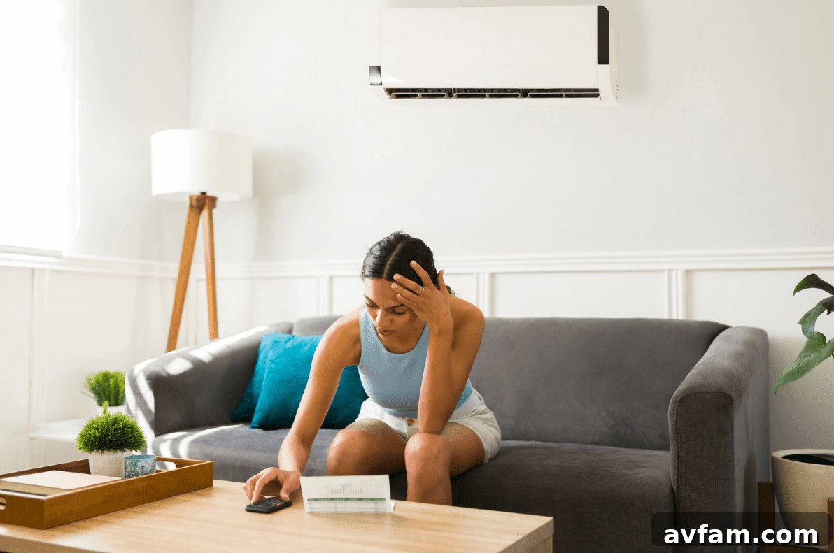 Frustrated woman on couch holding her