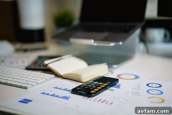 Remote control and book on a table, symbolizing smart