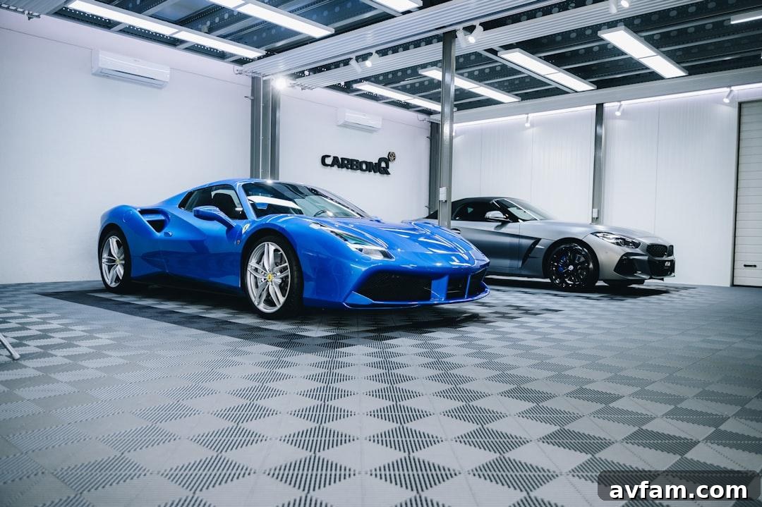 Concrete Floor Coatings for Homes: Types, Prep & Finish 2 A glossy epoxy-coated garage floor in a clean garage