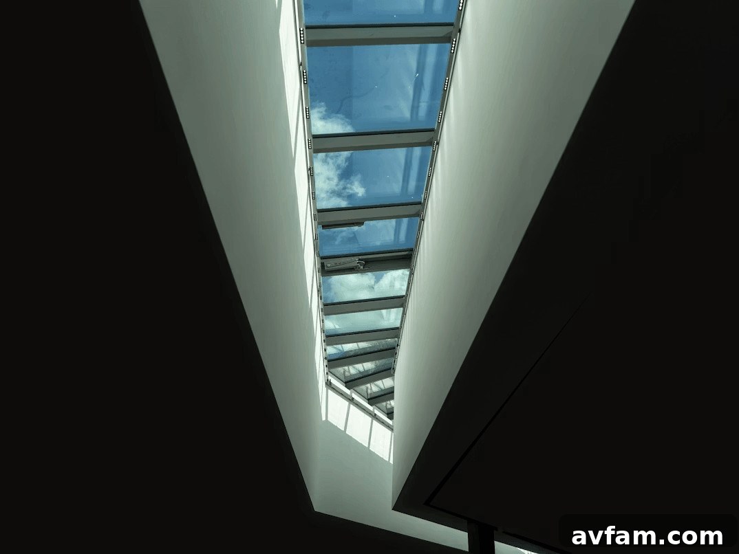 View of blue sky through a modern building window
