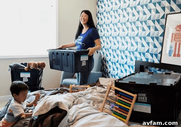 Moving With Kids: Moving Day and Week One Checklist 2 A woman and child stand next to a bed,