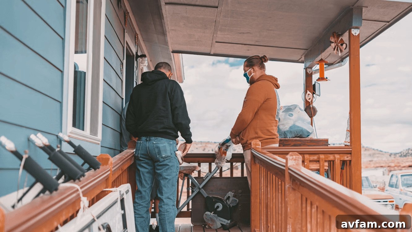 Two men standing on a wooden porch