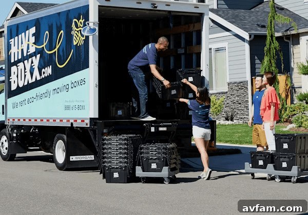 Man unloading a box from a moving truck